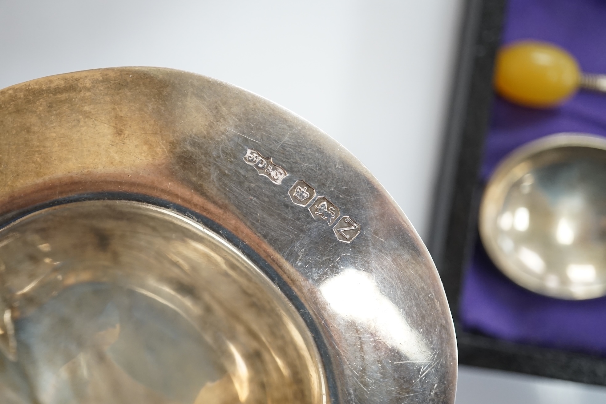 An Elizabeth II silver quatrefoil dish by James Dixon & Sons, Sheffield, 1967, 14.2cm, together with a silver spoon and pusher, silver bonbon dish, pair of silver wishbone nips and a cased set of plated spoons. Condition